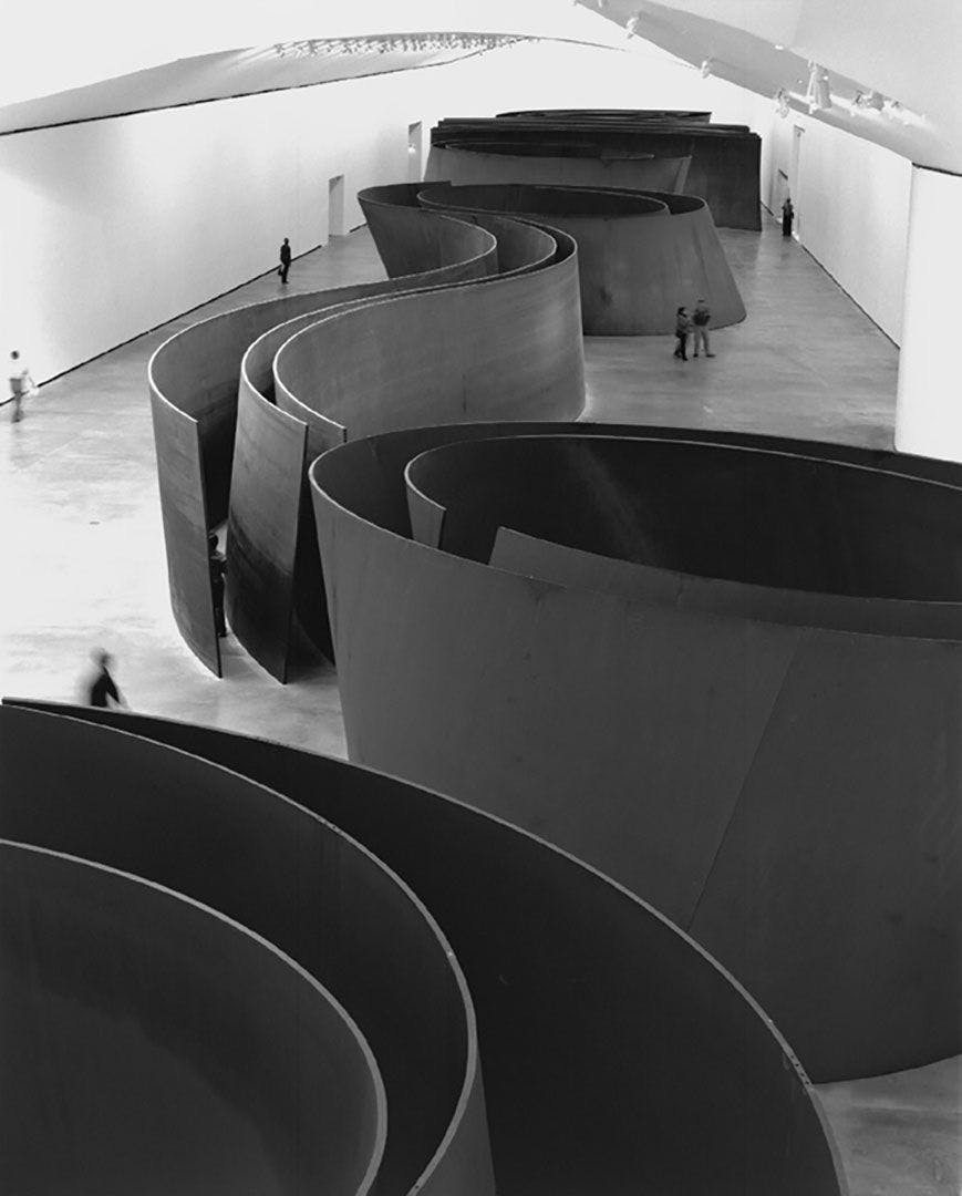Installation view at the Guggenheim Bilbao of The Matter of Time by Richard Serra, comprised of eight pieces steel sculptures